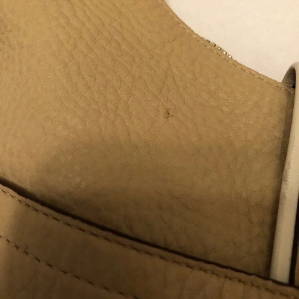 Coach cream pebbled leather perforated hobo bag